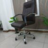 executive office seat, mesh visitors office seat, 2-door mahogany filing cabinet, ergonomic office seat