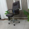 executive office seat, mesh visitors office seat, 2-door mahogany filing cabinet, ergonomic office seat