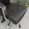 executive office seat, mesh visitors office seat, 2-door mahogany filing cabinet, ergonomic office seat